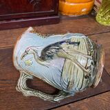 Majolica pitcher depicting a heron, 1900