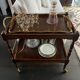 Wooden and brass rolling trolley