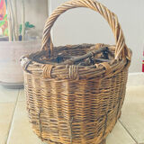 Wicker and hazel bottle basket from the early 20th century or possibly earlier.