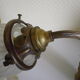 Wall lamps, opaque corolla and iridescent ochre lampshade, brass and wood support