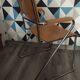 Modernist armchair with armrests