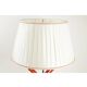 Lampe en métal laqué orange, base marbre, 1970.