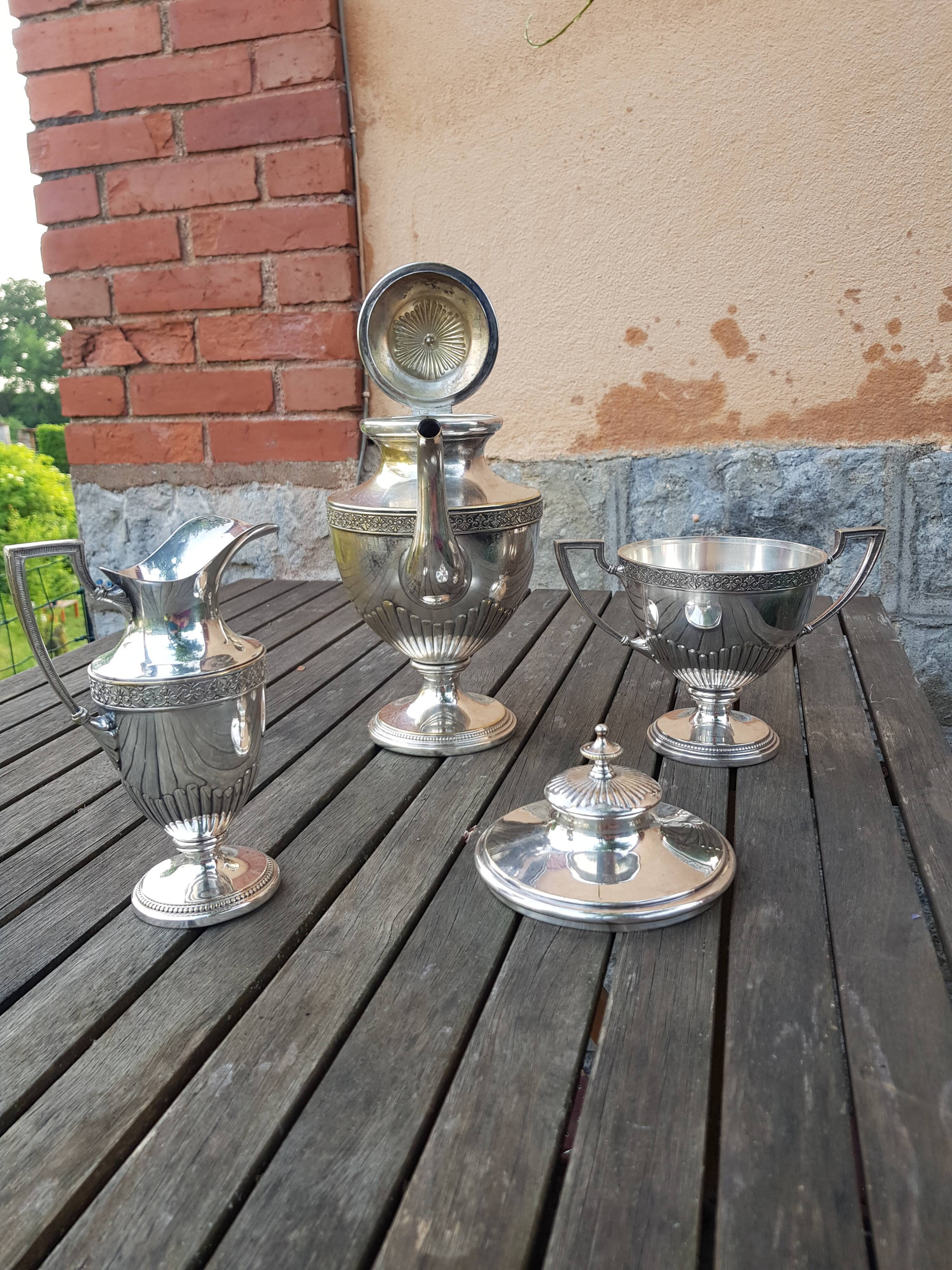 Silver metal coffee serving part