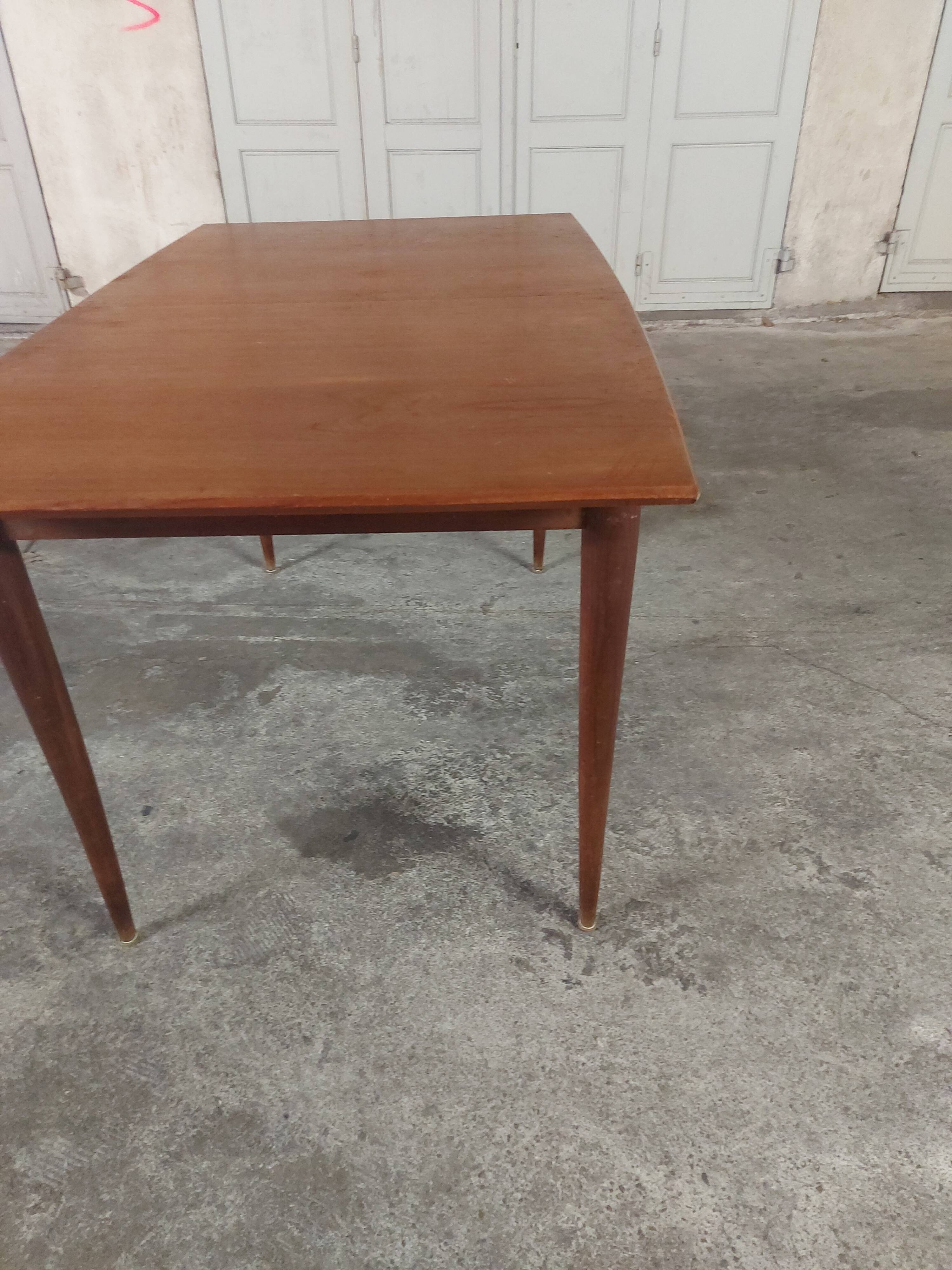 Scandinavian teak table with built-in extension