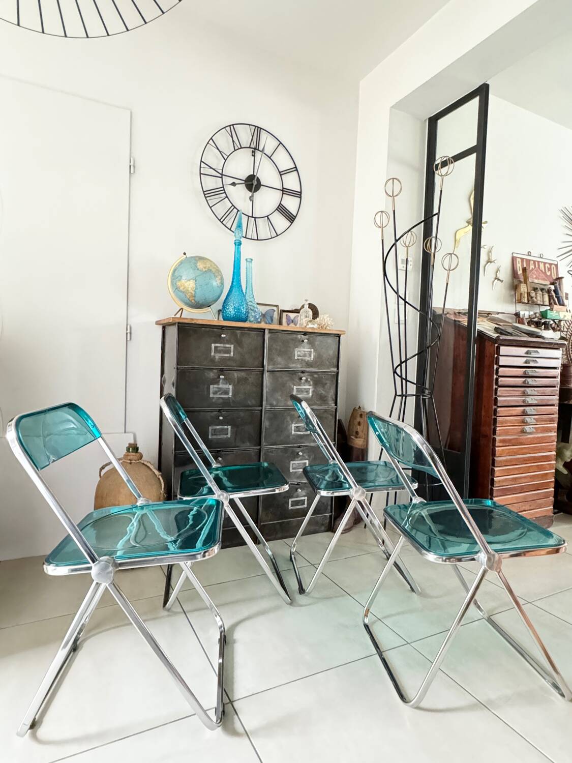 Set of 4 blue Plia folding chairs by Castelli