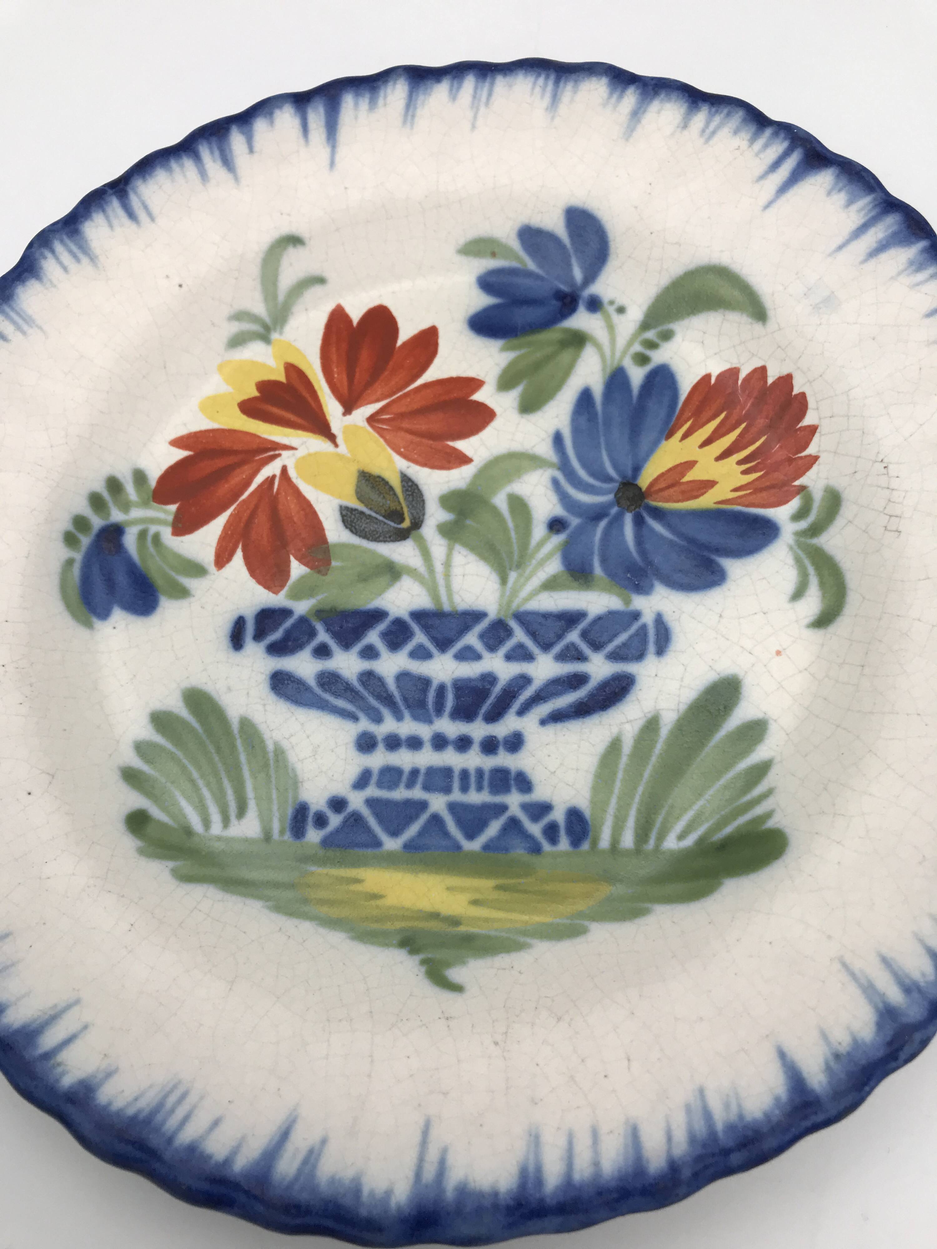 Antique auvillar earthenware plate decorated with basket of polychrome flowers