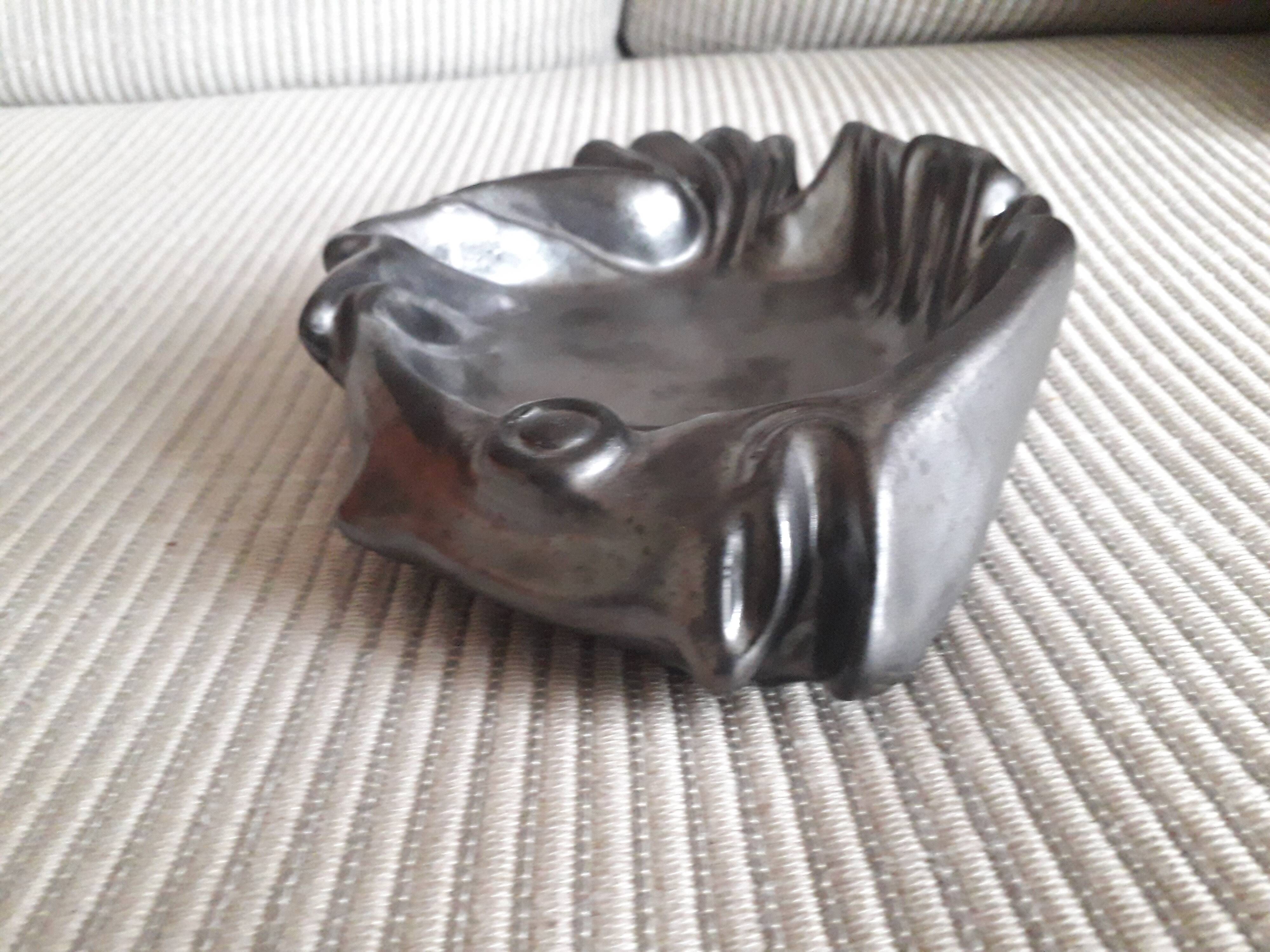 Vallauris fish-shaped pocket emptier