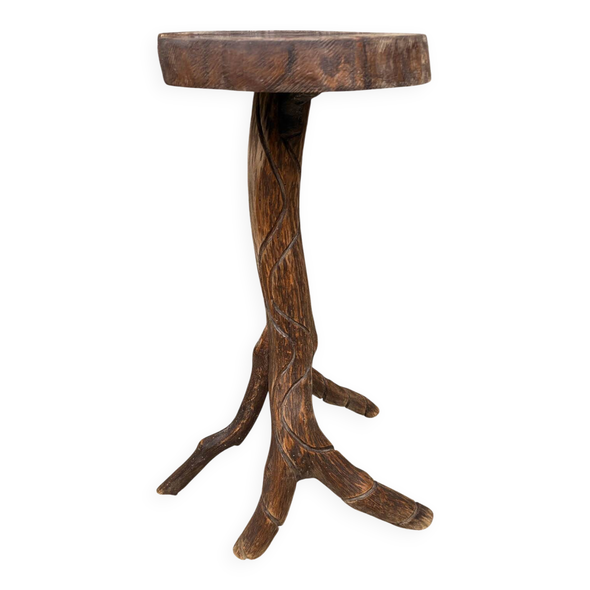 "Root" gueridon in solid wood — organic silhouette, brutalist spirit.