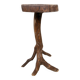 "Root" gueridon in solid wood — organic silhouette, brutalist spirit.