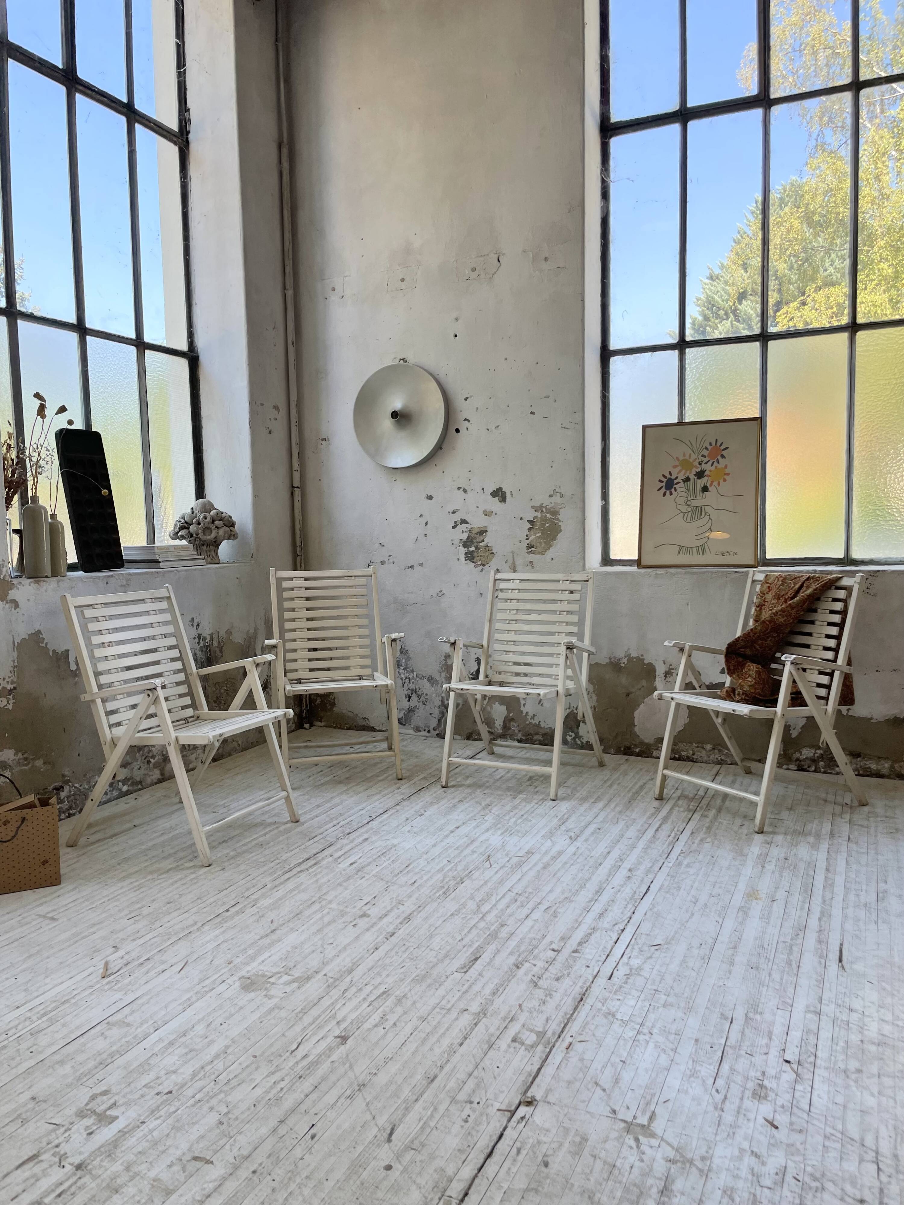 4 white wooden garden chairs