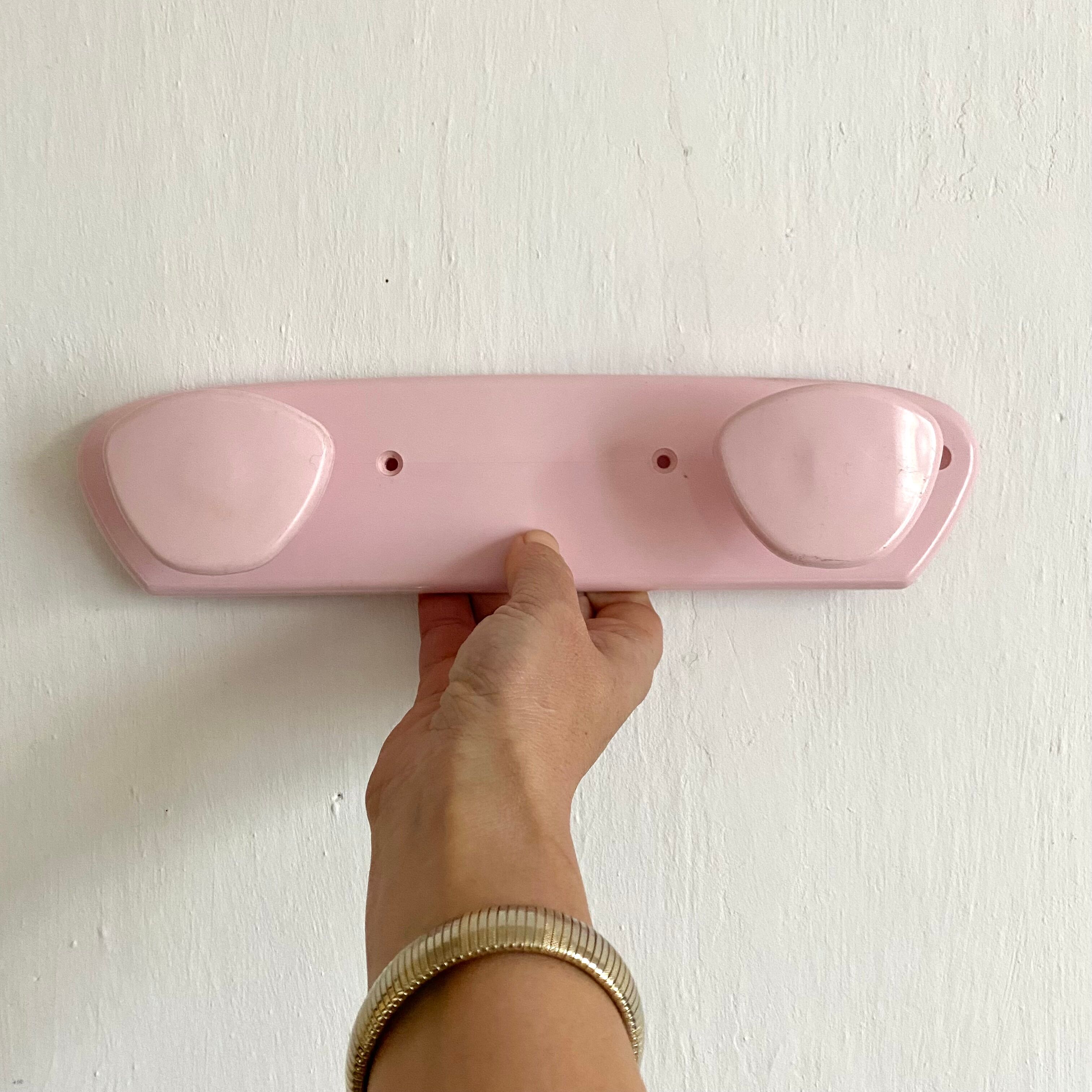 Vintage pink wall coat racks