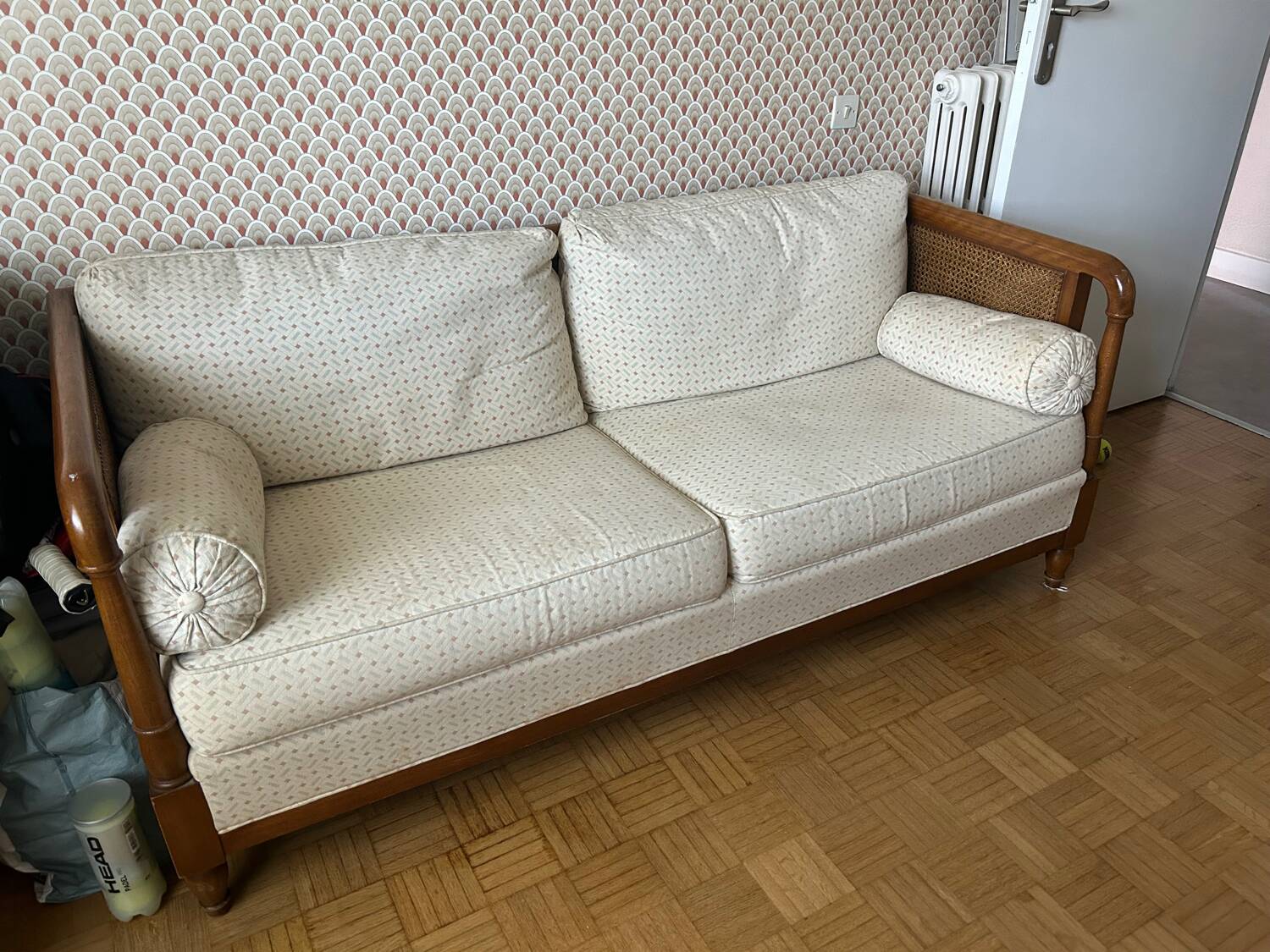Vintage convertible wooden and cane sofa