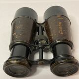 Old pair of XXth leather-wrapped binoculars
