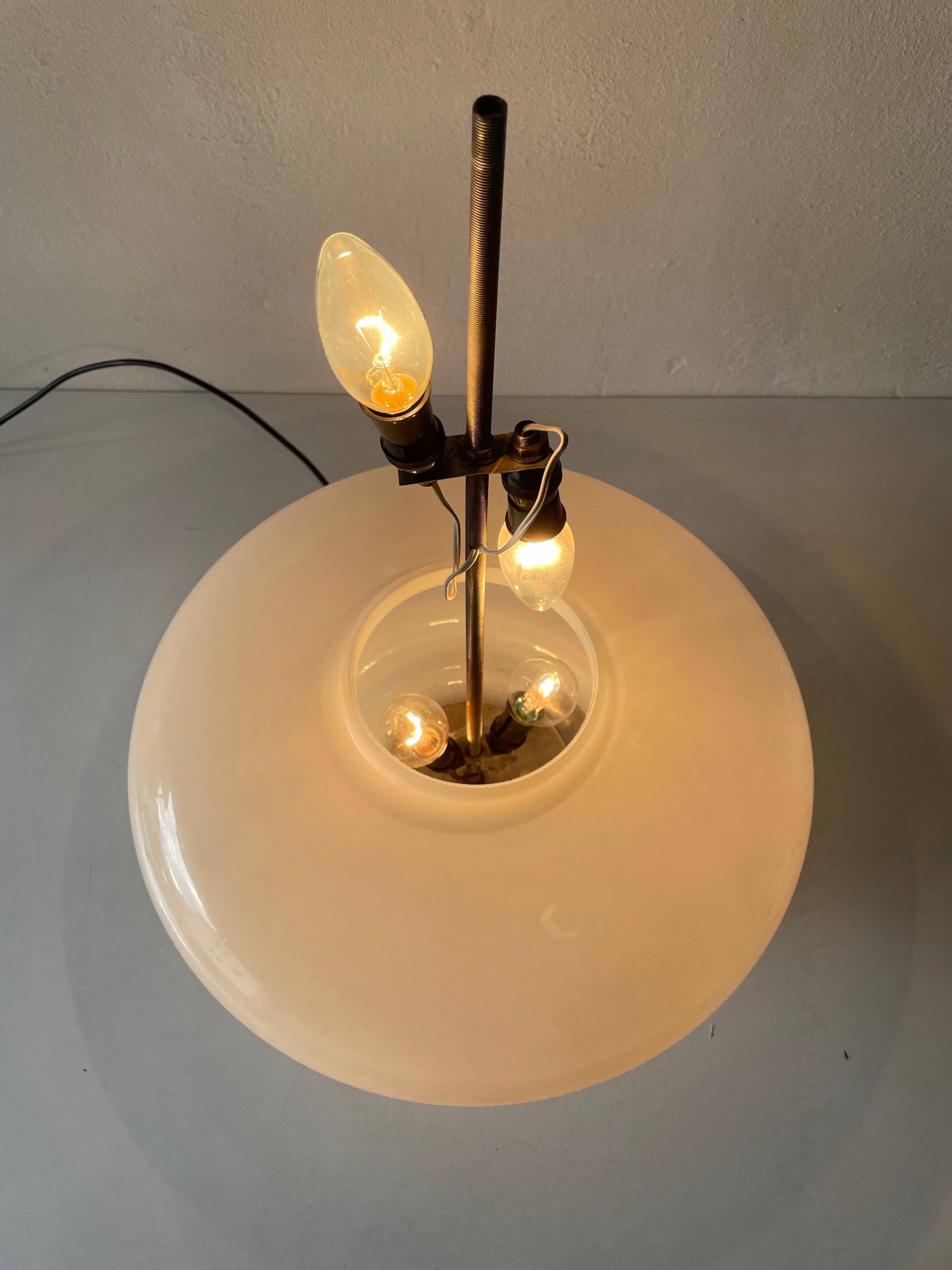 Large table lamp or floor lamp in opal glass and brass body, 1960s, Italy.