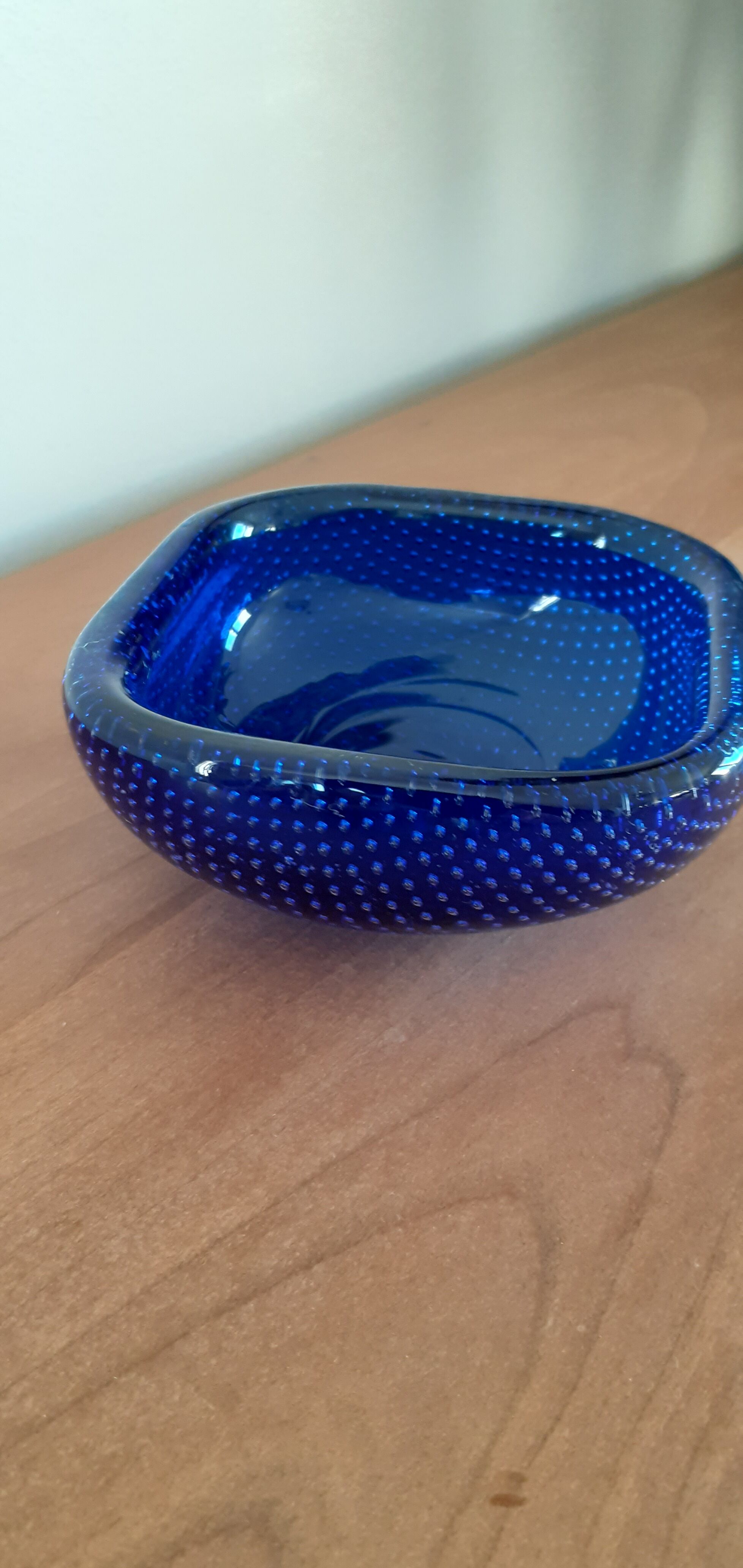 Empty blue bubbled glass pocket