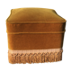 Gold velvet pouf with fringes