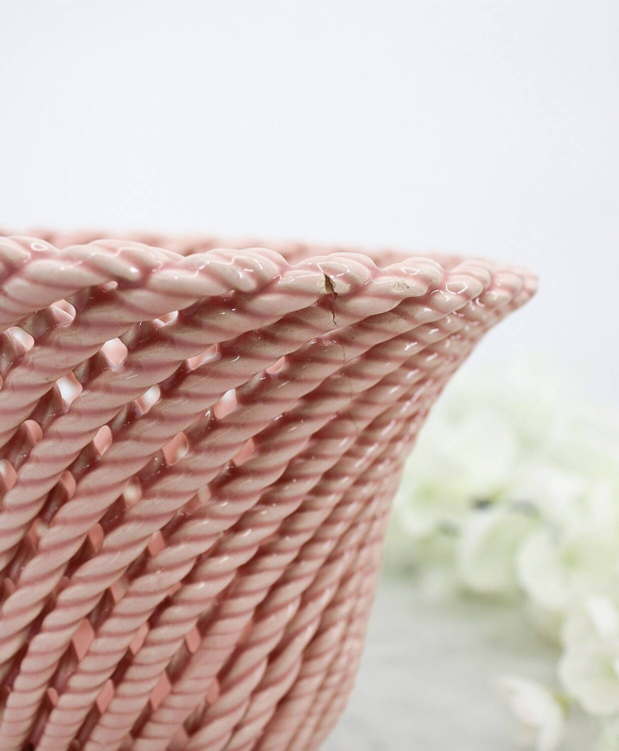 Small vintage handmade plant pot in pink woven ceramic