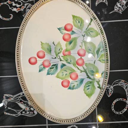 Oval Art Deco plate in earthenware and pierced metal with cherries