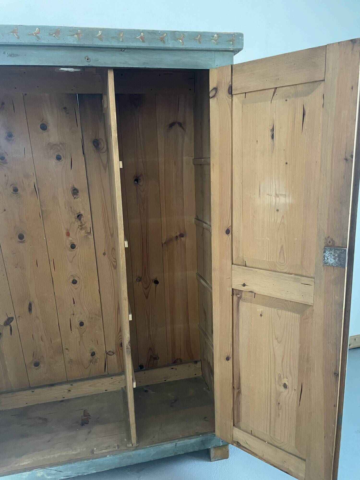 Wedding wardrobe painted in folk art style.