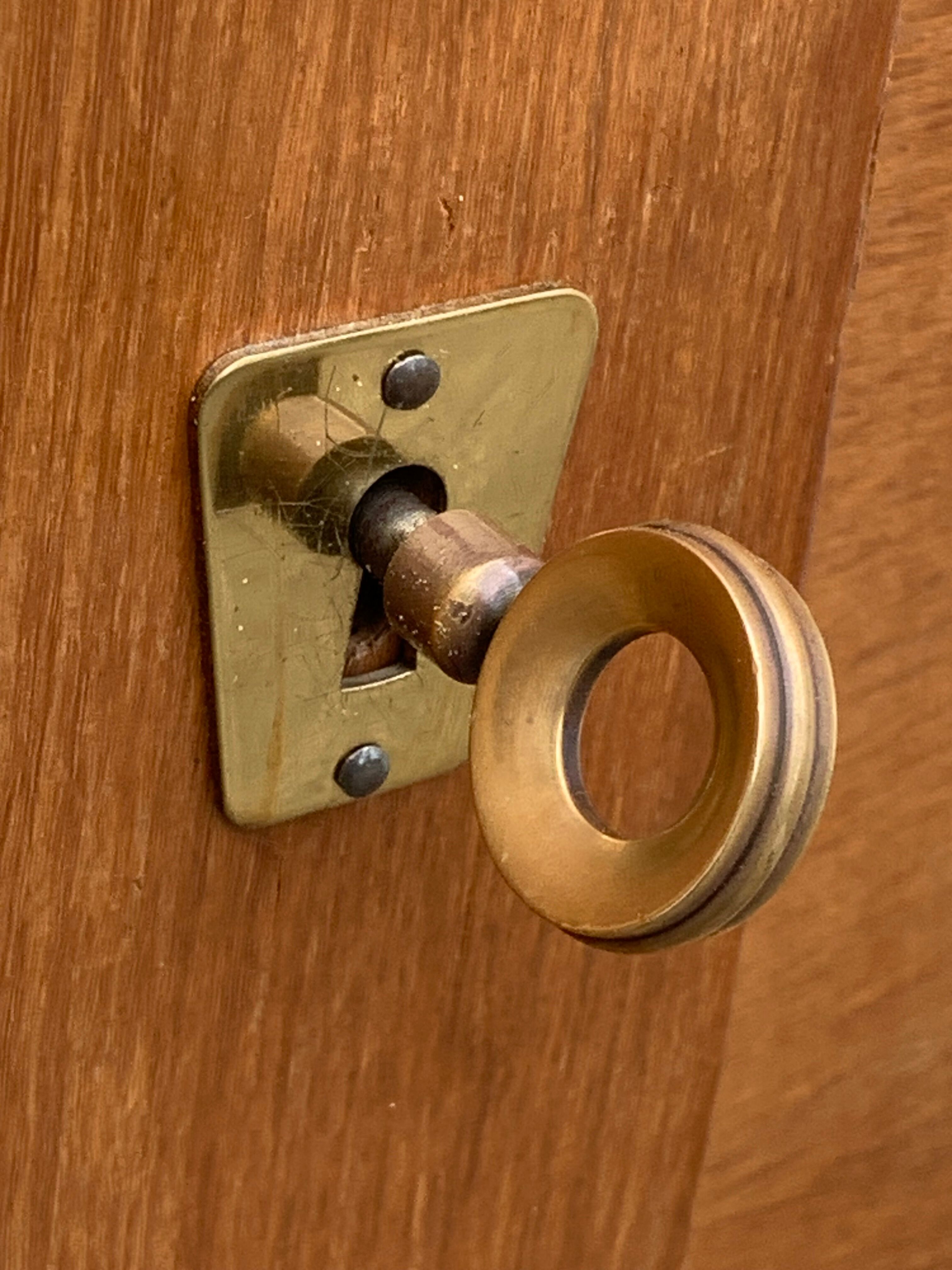 Rattan wardrobe with tapered legs from the 1960s.
