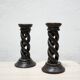 Pair of antique turned wooden candle holders