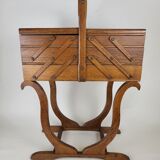 Worker on vintage wooden legs