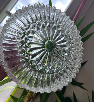 Pair of round vintage moulded glass ceiling lights.