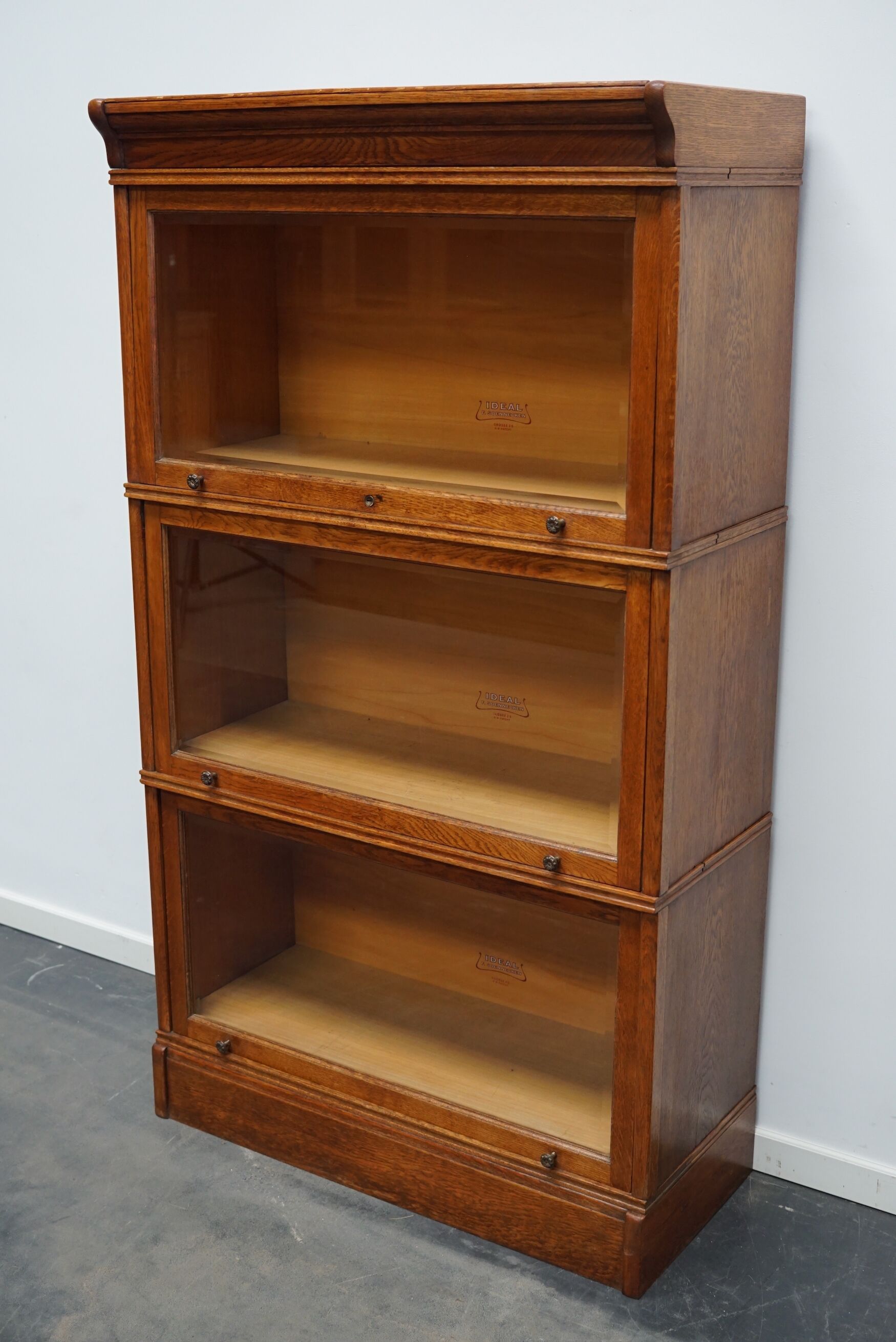 German oak bookcase with folding doors, ca 1900