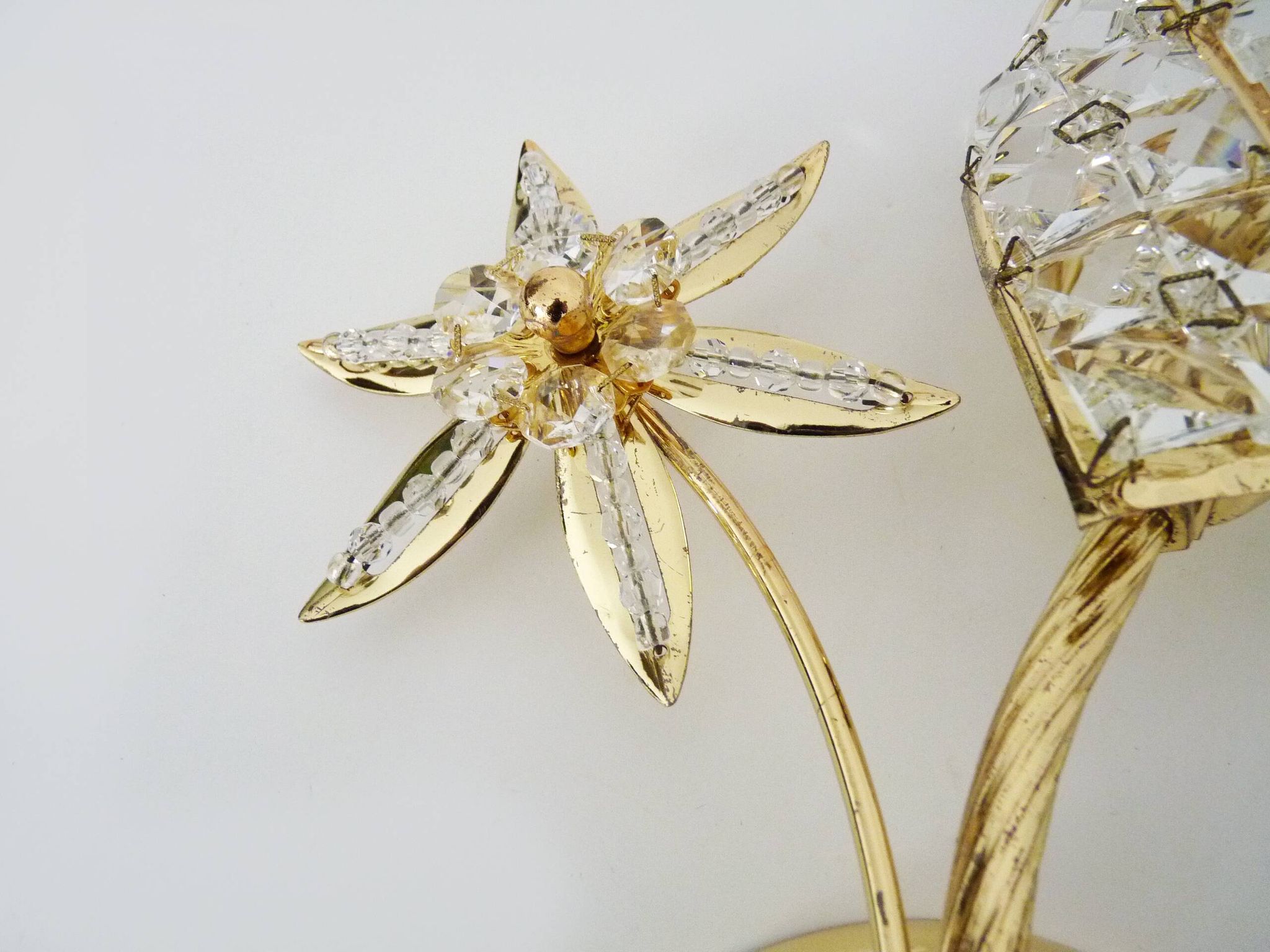 Pair of vintage floral wall sconces in gold metal and tassel