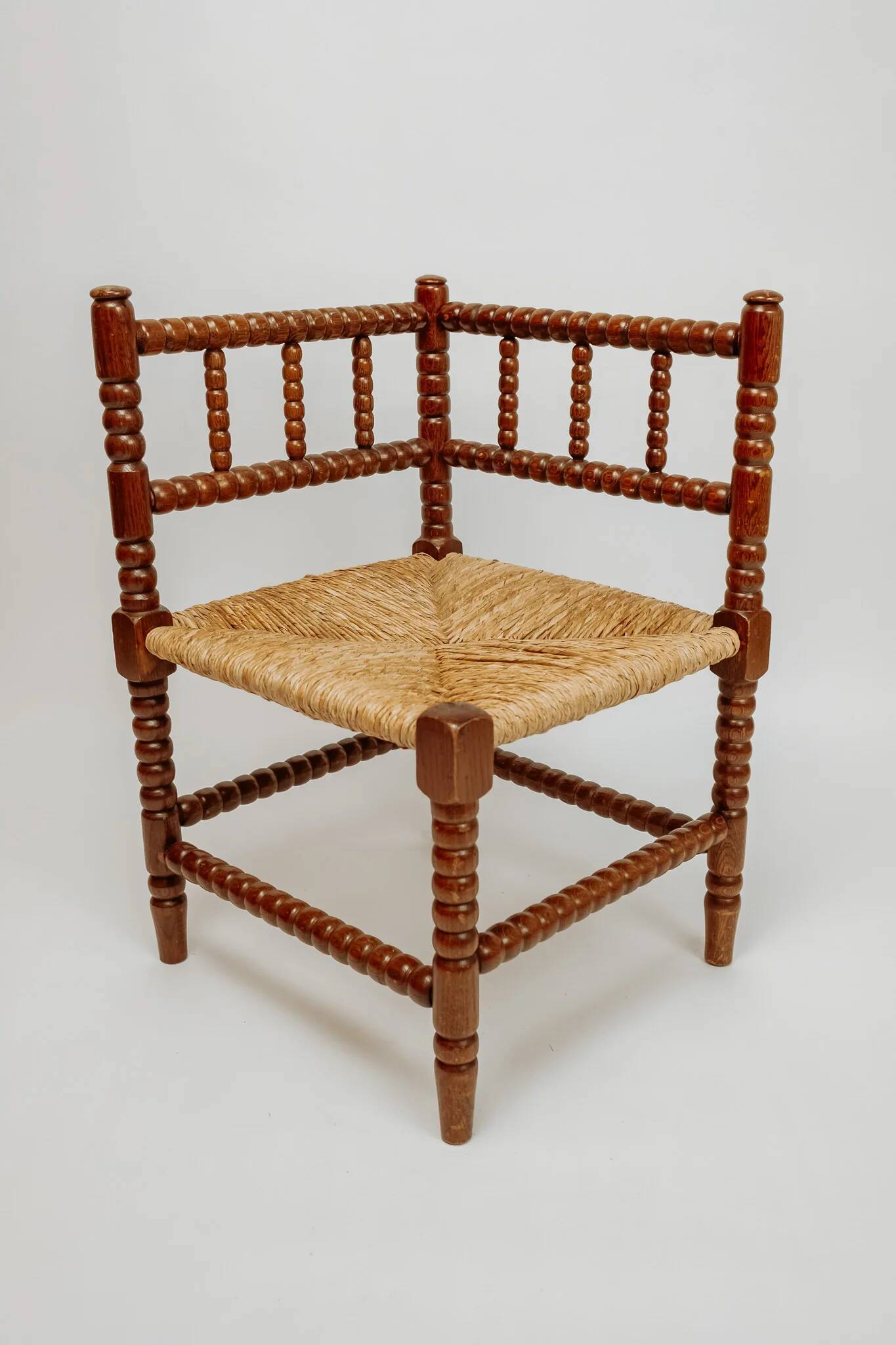 Classic vintage bobbin corner armchair