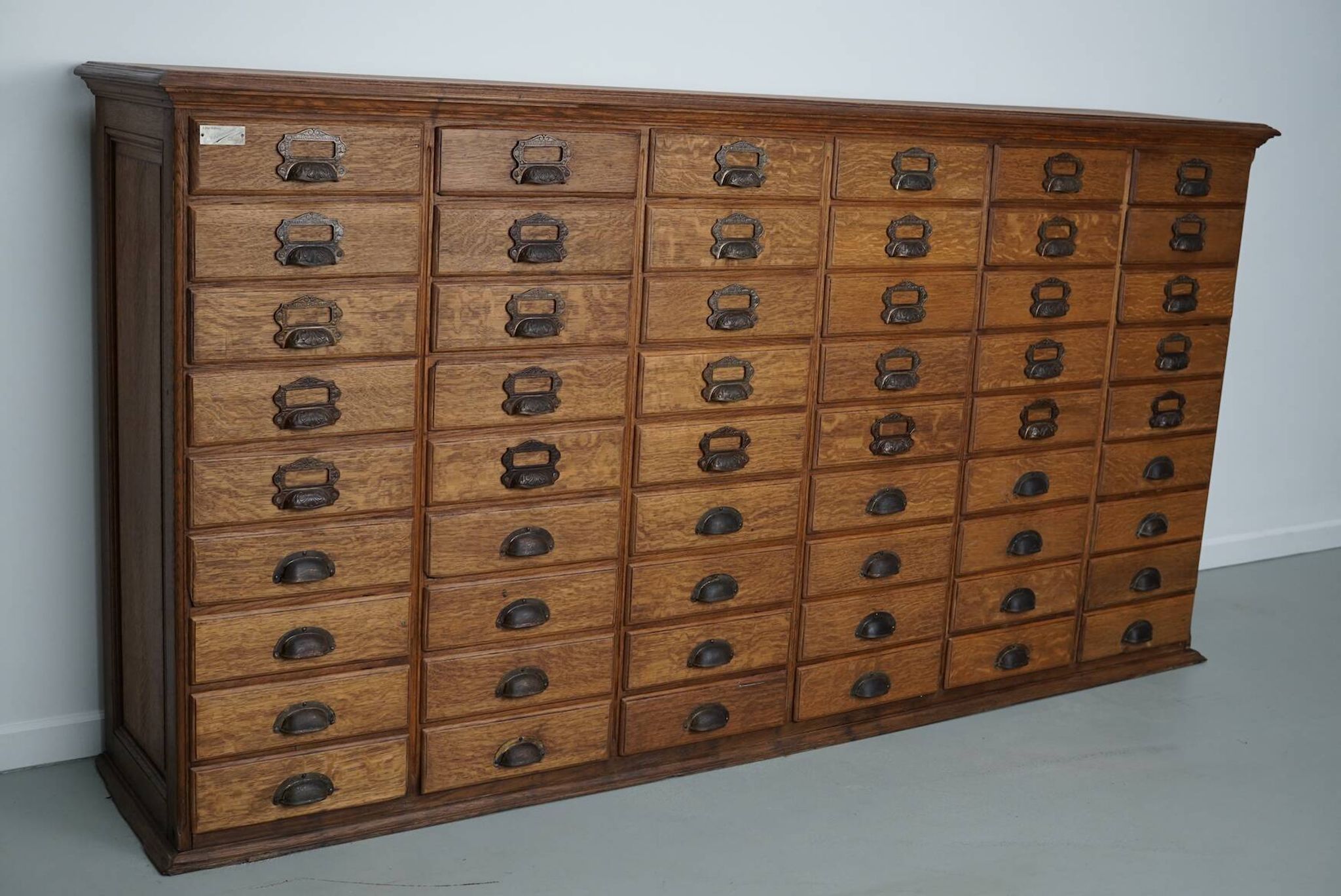 Antique French oak filing / apothecary cabinet by Chouanard, ca 1910