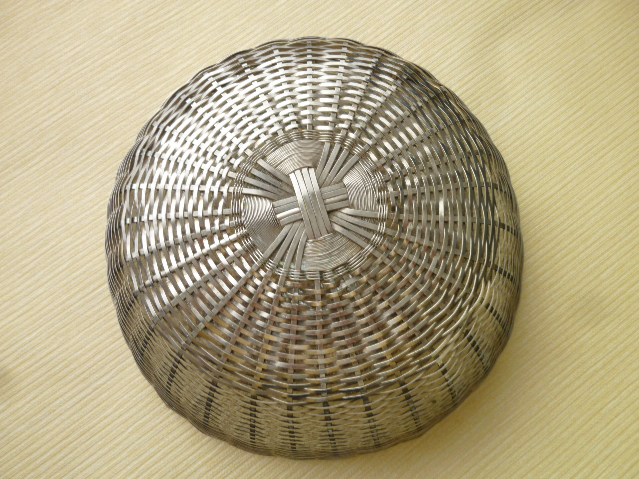 Weaving silver metal wire basket or basket