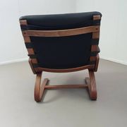 2 x Scandinavian black leather lounge chairs