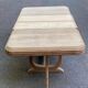 Art Deco dining table with a central pedestal, stripped in solid oak, with 2 extensions.