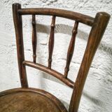 Antique children's chair in curved wood