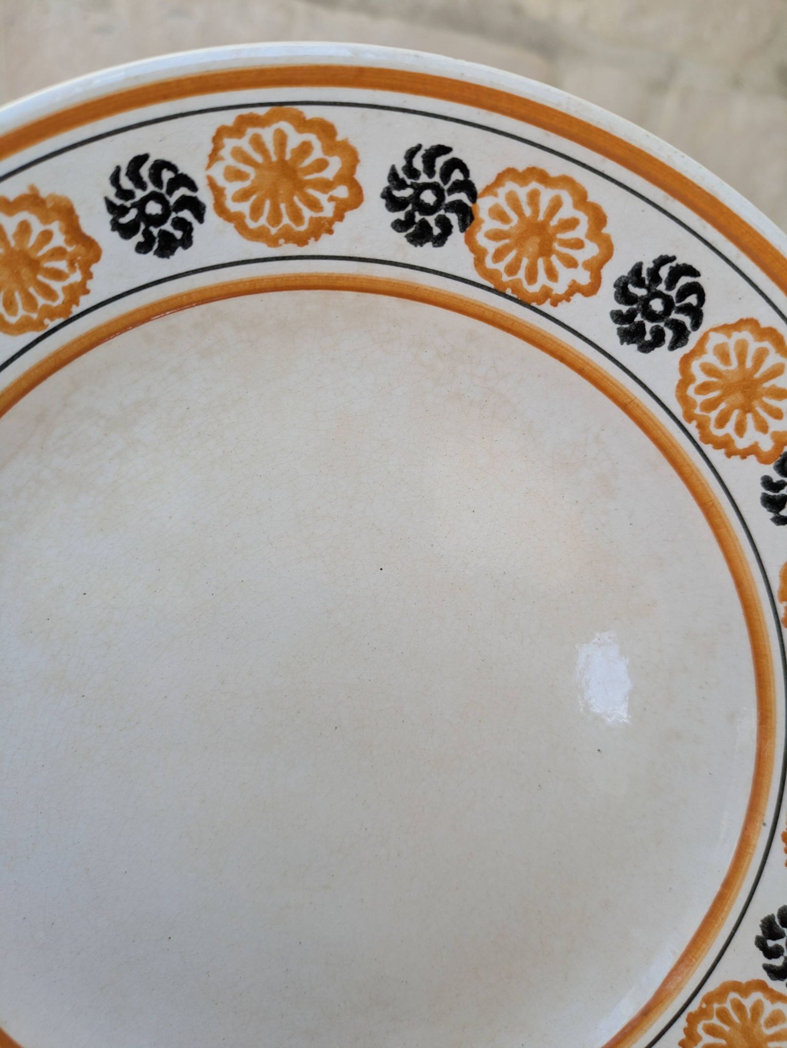 10 dessert plates Saint Amand Amandinoise frilled with orange and black flowers.