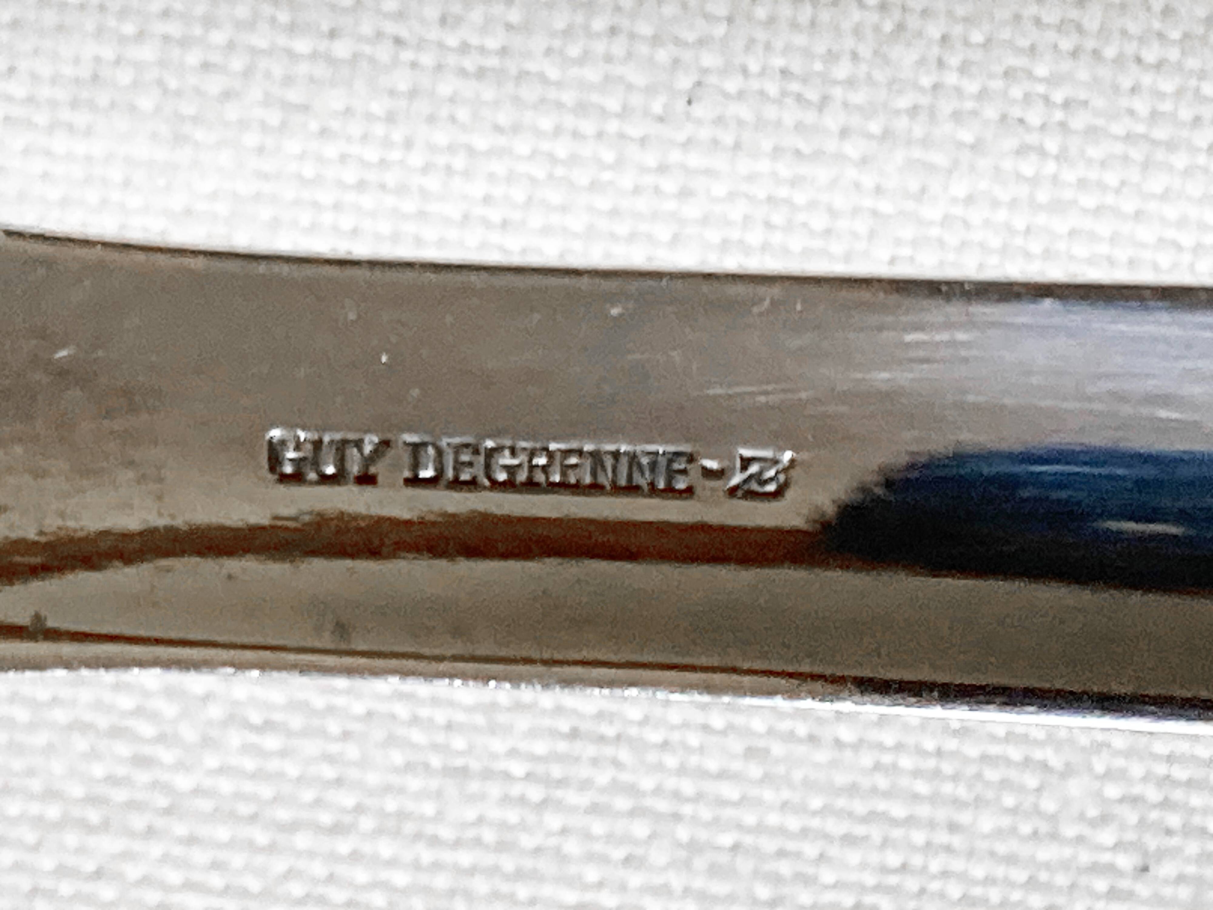 Stainless steel and bakelite serving cutlery, Guy Degrenne