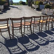 7 curved wooden bistro chairs by Baumann