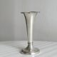 small antique silver-plated metal vase