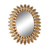 Miroir ovale soleil en laiton doré vintage 1960