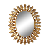 Oval sun mirror in vintage gilded brass 1960