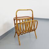 Side table with vintage rattan and wood magazine rack from the 60s