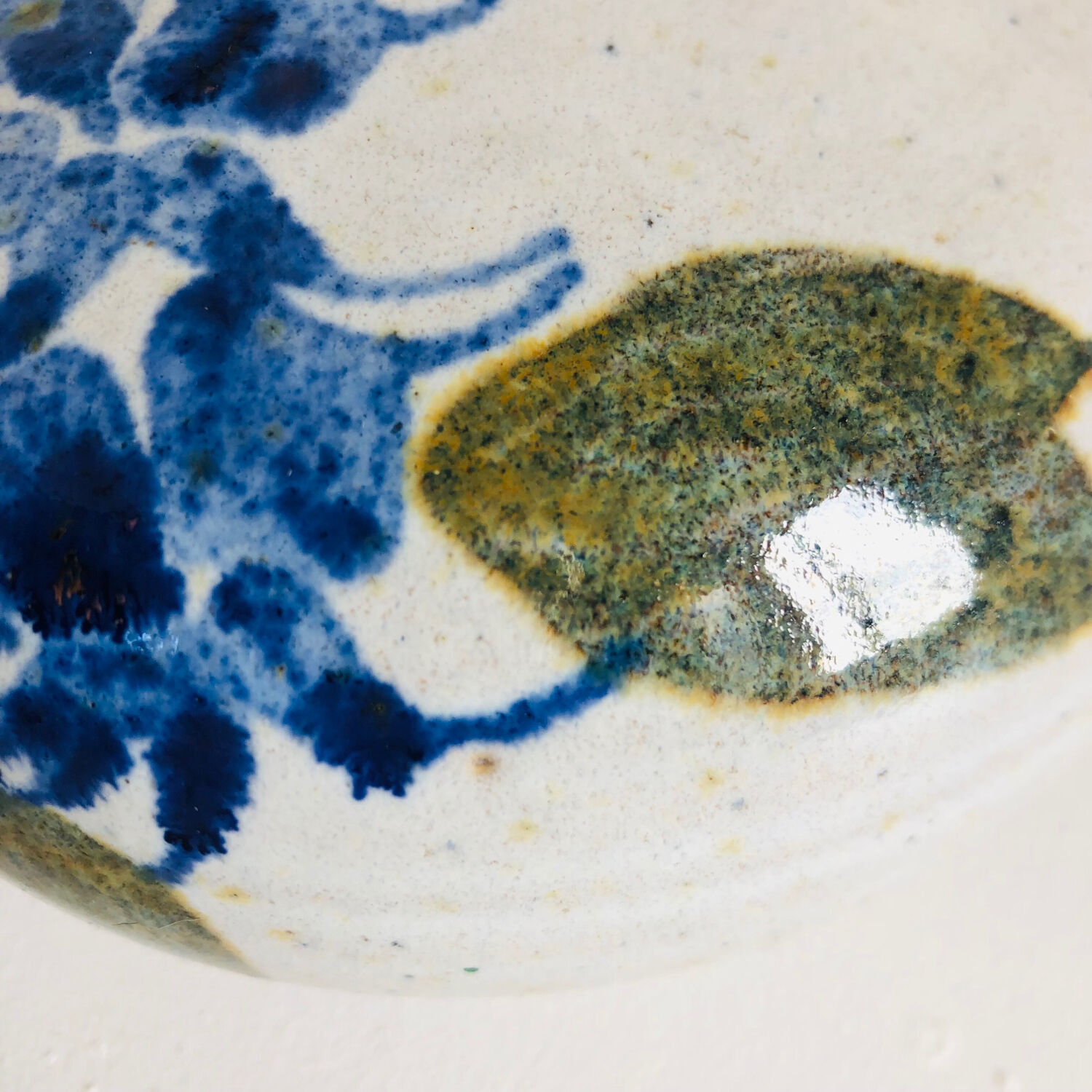 Ceramic bud vase with floral decoration