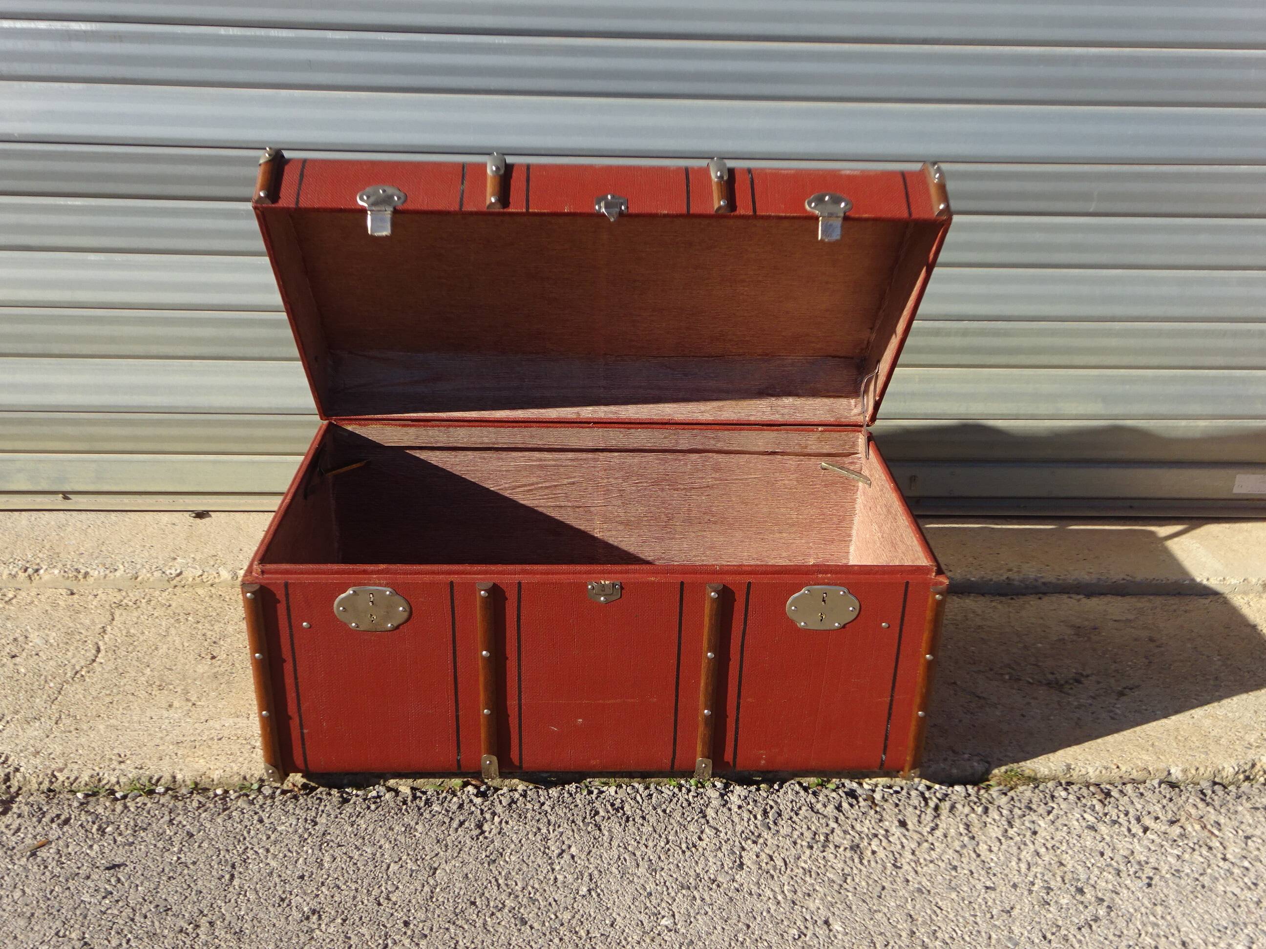 Old curved travel trunk