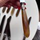 18 Wiskemann table knives in horn