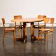 Oval dining table with 2 extensions.