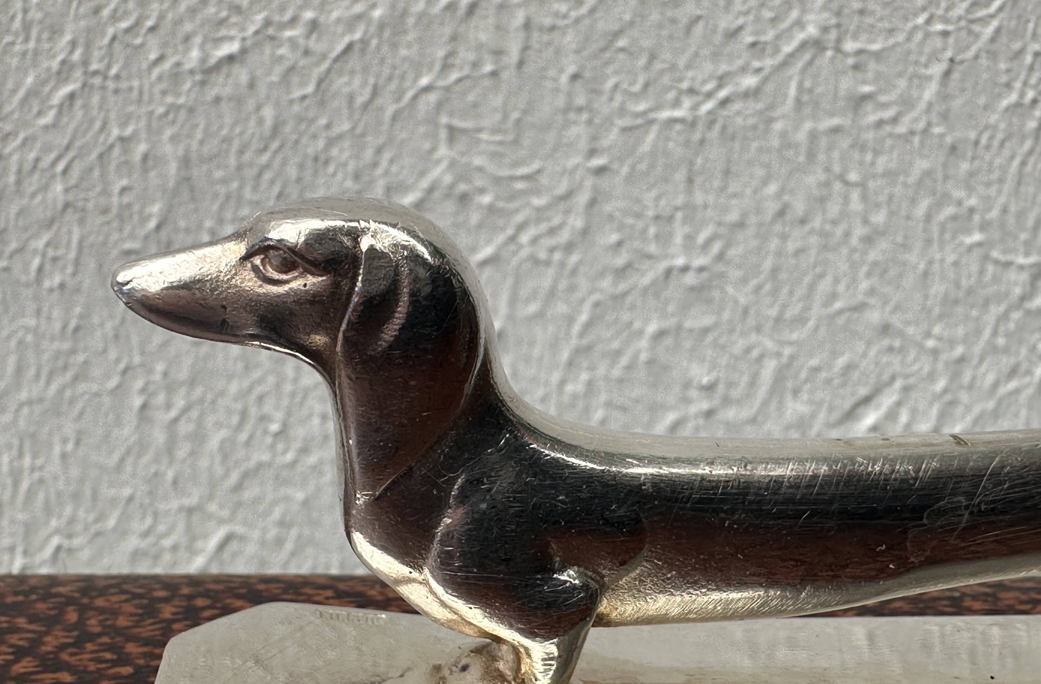 12 antique silver-plated bronze knife rests in modern art deco animal designs.