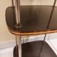 Etagère sur pied en formica et métal doré 1960
