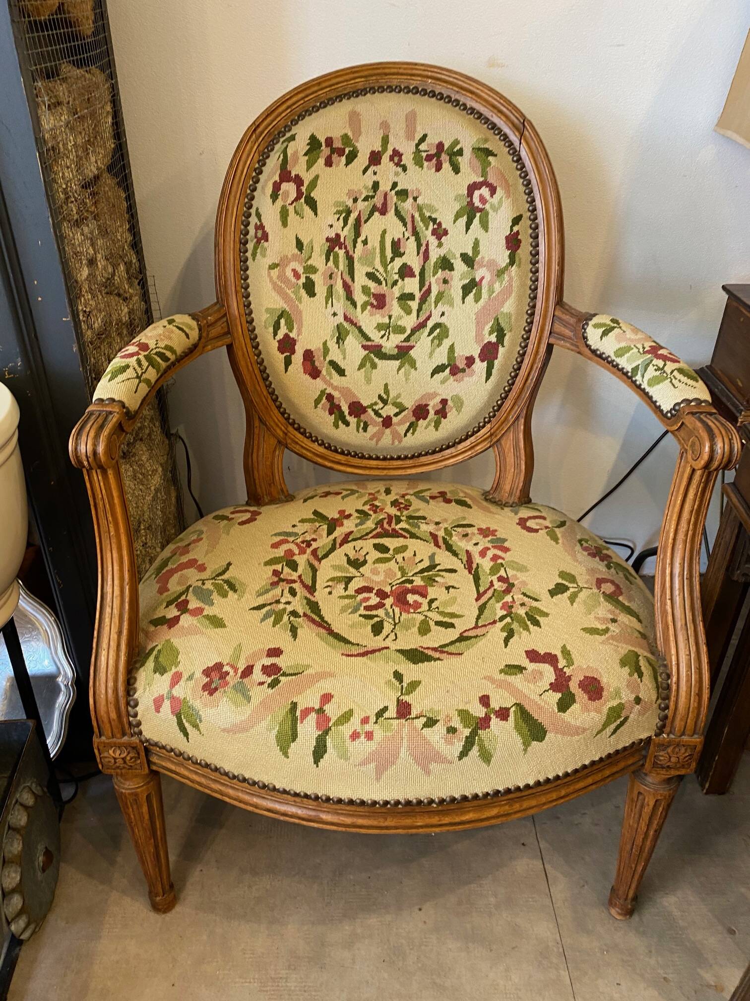 Louis XVI style medallion armchair with floral needlepoint tapestry