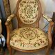 Louis XVI style medallion armchair with floral needlepoint tapestry